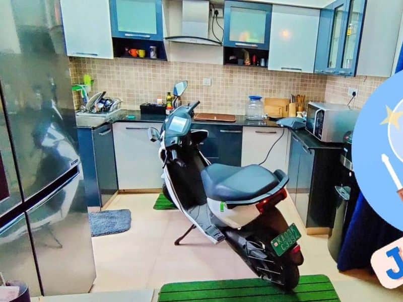 Ather Electric Scooter Getting Charged In Kitchen Of 5th Floor Flat