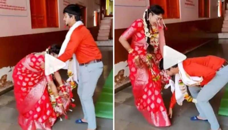 viral video groom and bride touch each others feet