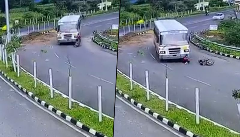 Biker miraculously escapes unhurt after getting run over by bus; watch video - gps