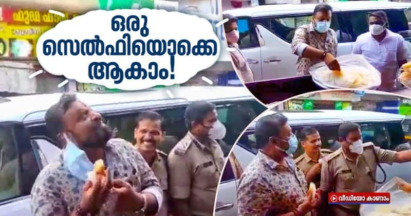 police officer taking selfie with suresh gopi