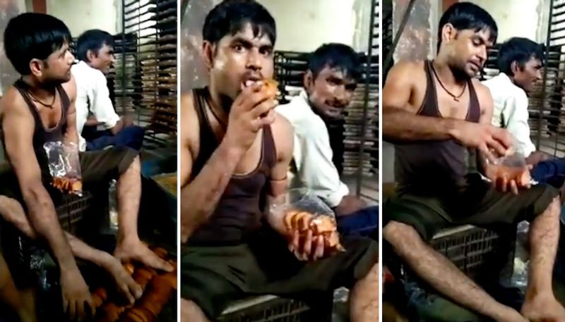 Factory workers lick and put feet on baked rusks before packing; video goes viral-tgy