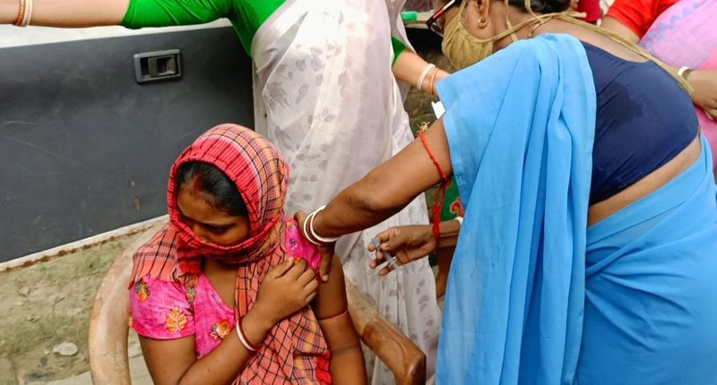 covid  vaccination For tribal people in hunasur snr