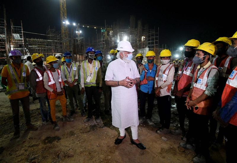 Covid vaccination health check ups must for workers says PM Modi on new Parliament building inspection ckm