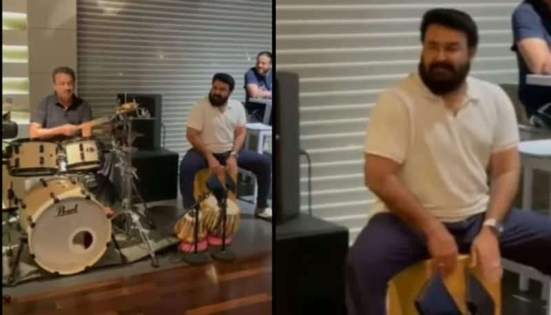 actor mohanlal play cajon for enjoy enjami song