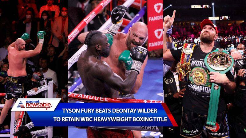 Tyson Fury beats Deontay Wilder to retain WBC heavyweight title