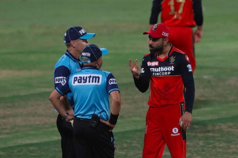 IPL 2021 Watch Video Kohli loses cool Umpire Sharma offers explanation