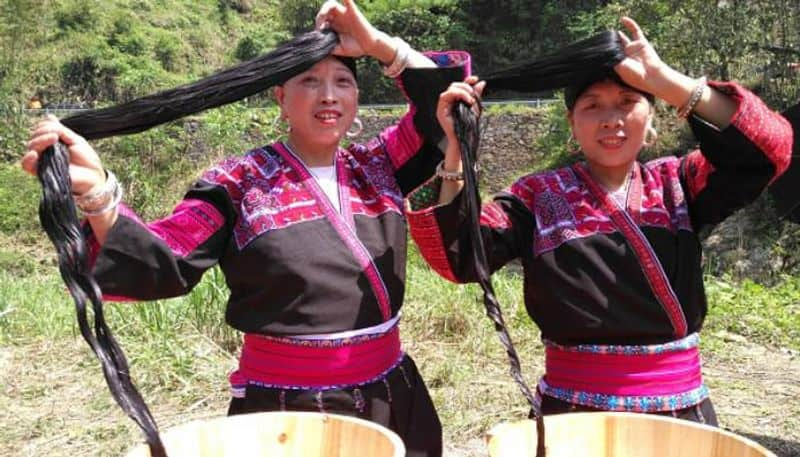 Huangluo Yao village with long haired women