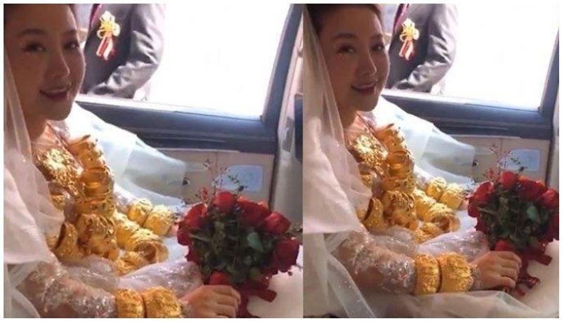 bride wears 69 kilograms of gold for wedding stuns guests