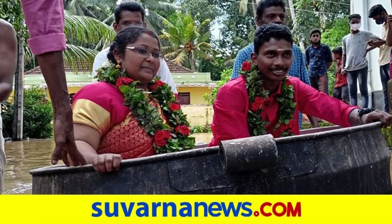 Amid heavy rains in Kerala bride and groom use cauldron to reach wedding venue pod