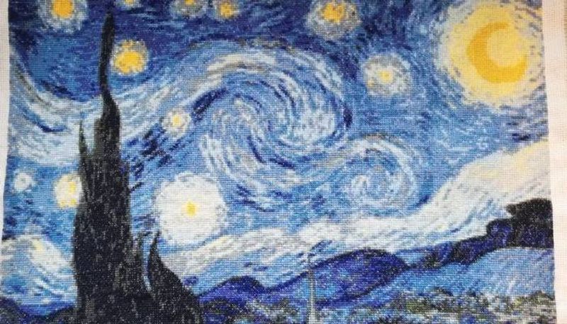 woman embroidered a replica of the starry night