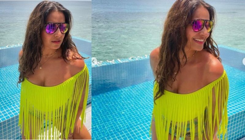 Bipasha Basu in neon green outfit in Maldives Posts