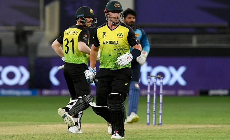 T20 World Cup 2021 David Warner helps australia to beat srilanka by 7 wickets in dubai ckm