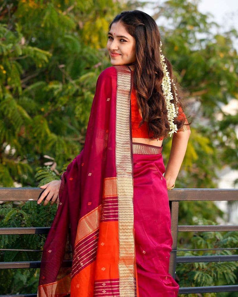 Actress Vani Bhojan latest stills in Red Saree