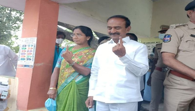 Huzurabad bypoll etela rajender and his wife jamuna cast his Vote