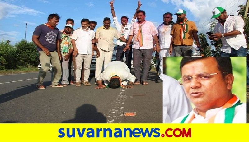 Congress MLA Srinivas Mane bowed to the ground at Hangal entrance after  victory In by Poll rbj