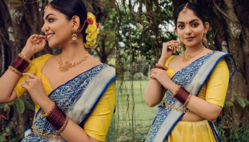 Ahaana Krishna in yellow kanchipuram lehenga