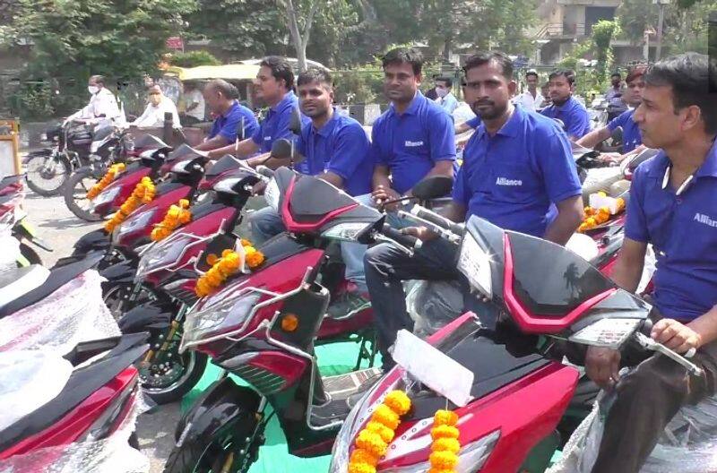 Diwali Gift Surat bases company gifts Okinawa electric scooter to 35 of its employees ckm