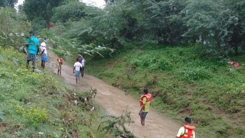 jcb driver drowns in a flood water in madurai