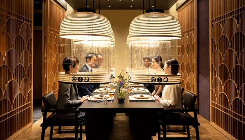 Guests Seated in Fish Tank in a restaurant