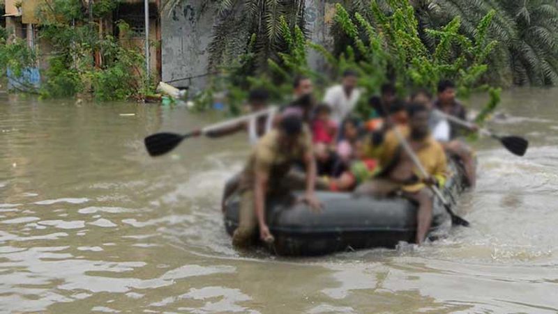 chennai floods...disaster team rescues postpartum woman baby