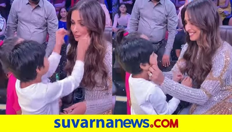 Bollywood Actress Malaika Arora reacts after a young boy pulls her cheek on Indias Best Dancer 2 dpl