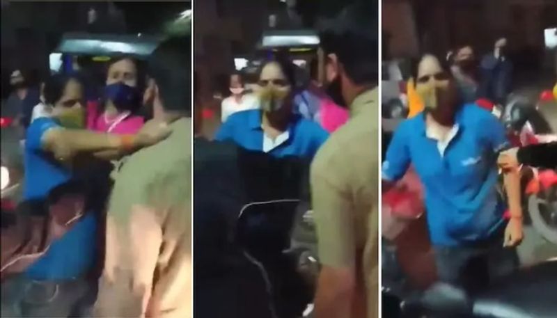 Delhi woman slaps car driver in the middle of the road viral