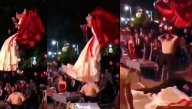 viral video of Bride and groom fall from a crane