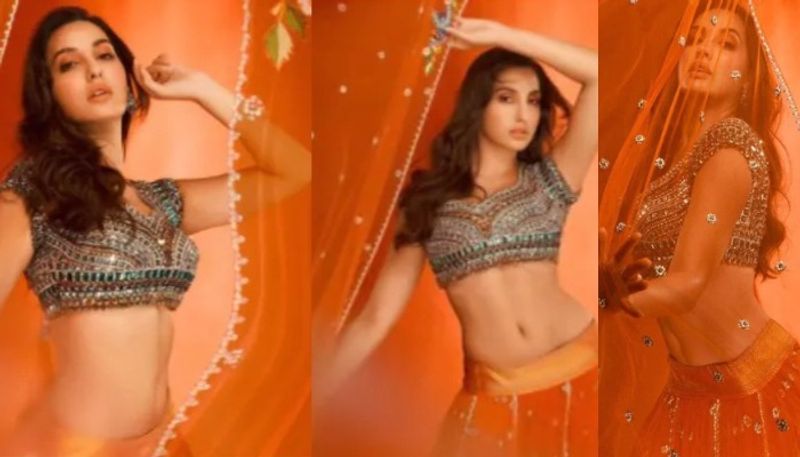 Nora Fatehi in Rs 1.35 lakh orange lehenga