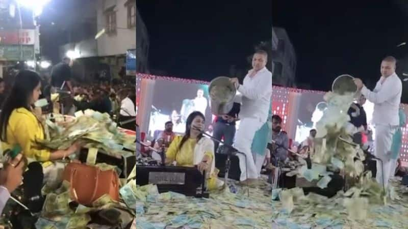 Gujarati singer is showered with bucketful of notes in viral video