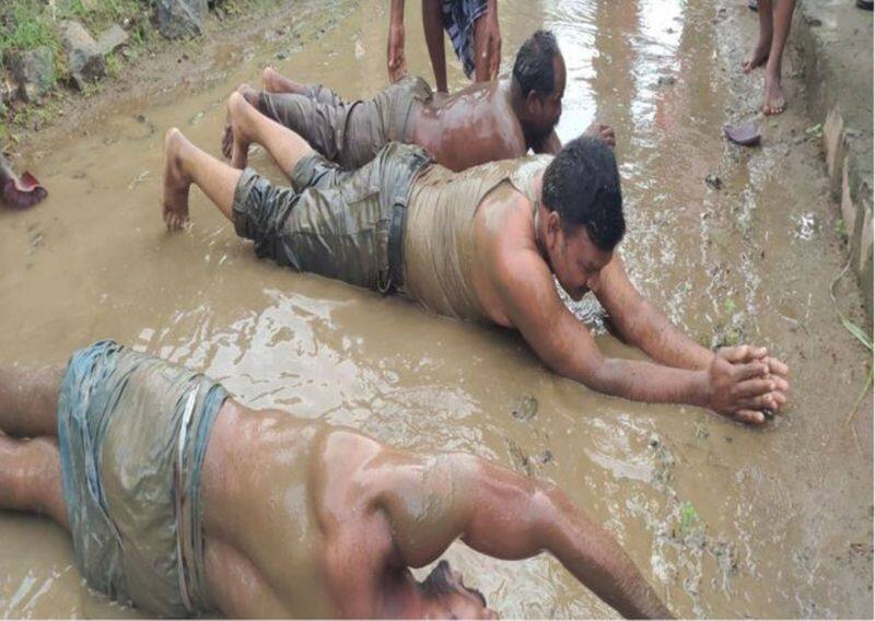 People protest on road rain water against admk panchayat president at mallasamudram