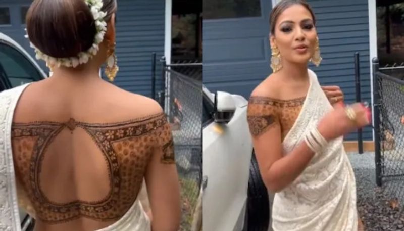 Video of woman wearing henna blouse with saree goes viral