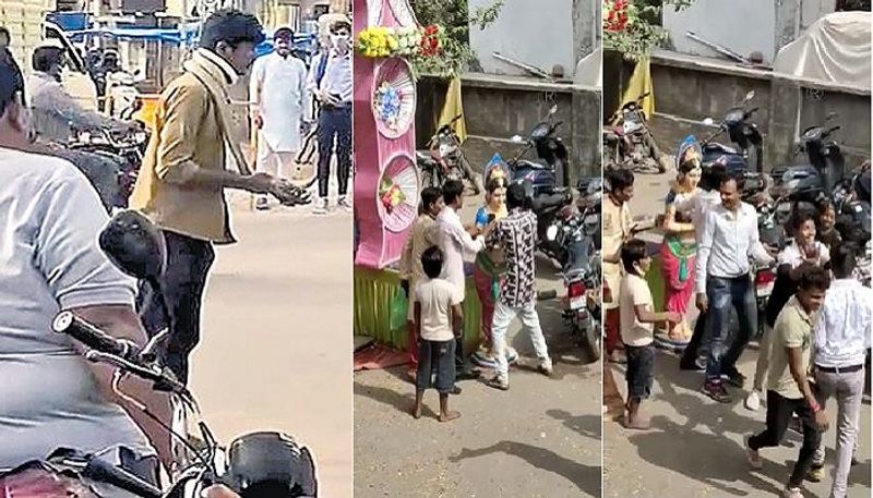 drunken beggar tie snake around the neck, and another man dancing with doll