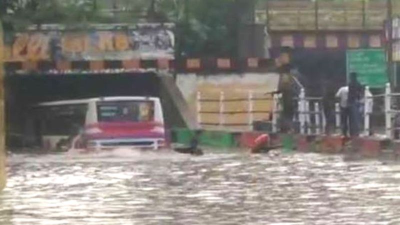 Eight people, including a child, were trapped inside the bus due to rain water entering the bus