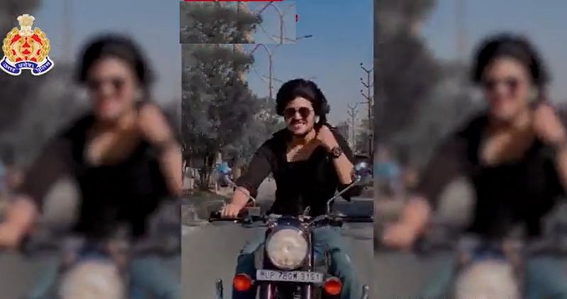 UP police issued fine to Man lipsyncing Bollywood song and ride bike recklessly without helmet ckm