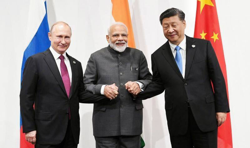 Vladimir Putin's aide says Russia, India and China to hold summit very soon