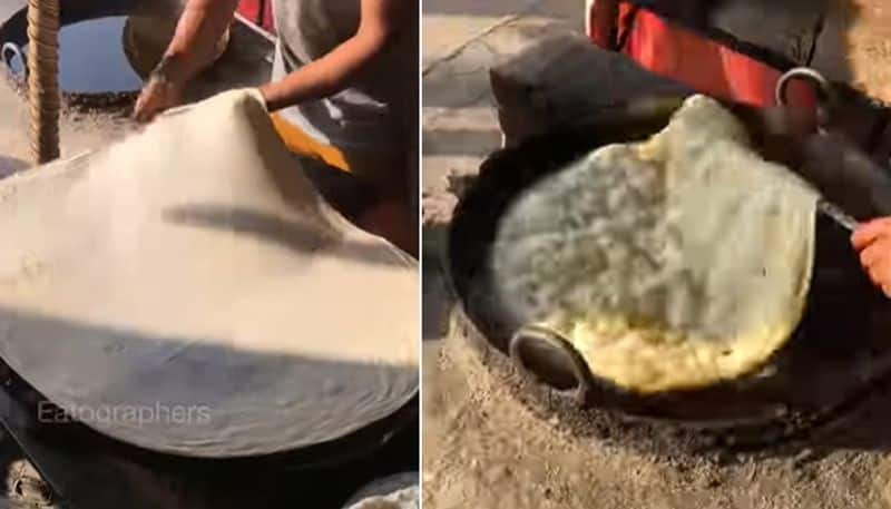 massive paratha made by street vendor