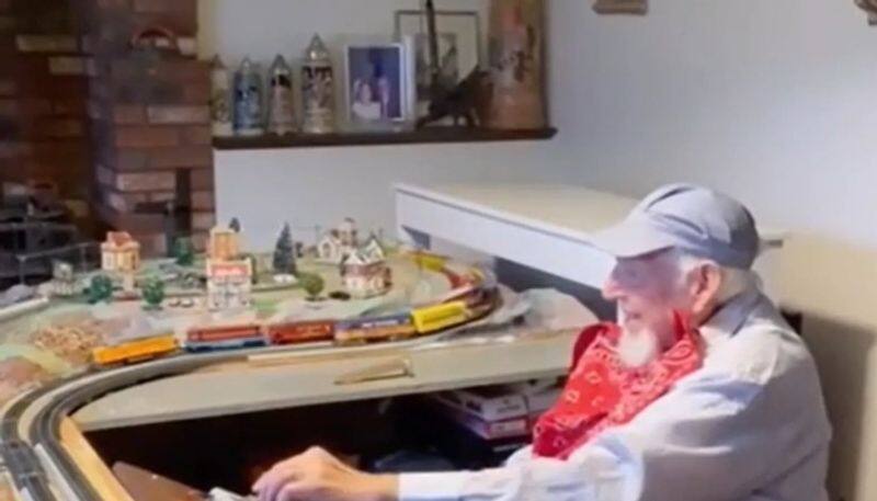 Grandpa shows off toy train set in this viral video