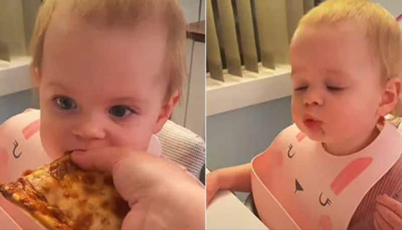 Baby tries pizza for first time video viral