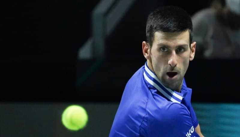 Australia bars novak djokovic, cancels entry visa, stuck in airport, serbian president demands australian entry