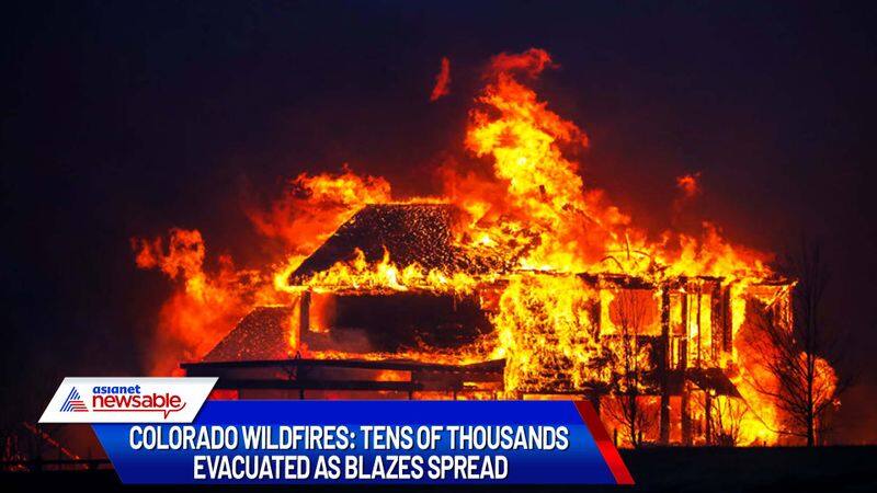 Colorado wildfires Tens of thousands evacuated as blazes spread state of emergency declared