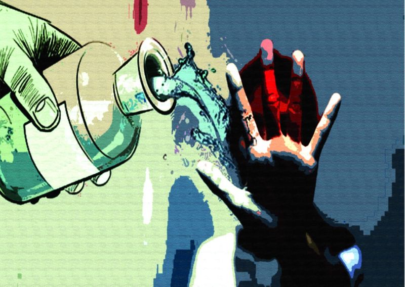 A woman has been admitted to a hospital in Coimbatore after police threw acid on her