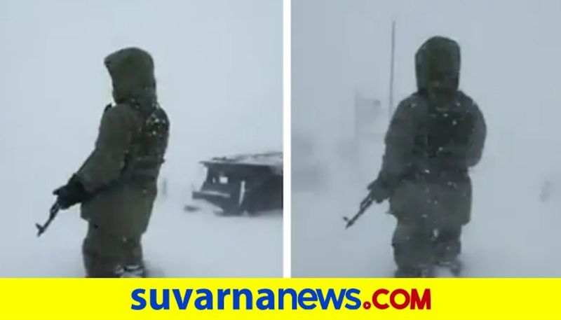 Army jawan stands firm amid fierce snow storm in Kashmir watch viral video akb