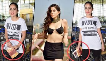 Urfi Javed flaunts Bhagavad Gita at airport; netizens shocked to see her in full clothes (Pictures)