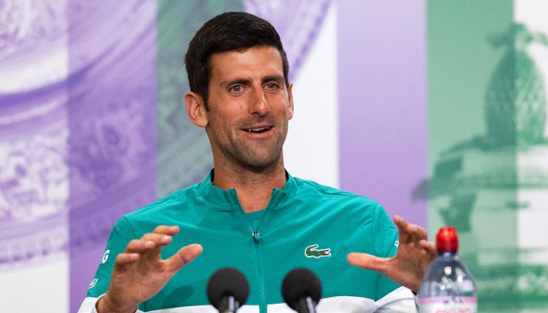 Will sacrifice French Open Wimbledon trophies if told to get Covid 19 jab Says Novak Djokovic kvn