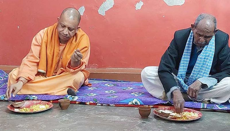 Uttar Pradesh news Chief Minister Yogi Adityanath had a meal at a Dalit household IN Gorakhpur san