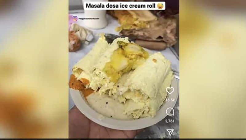 street vendor makes masala dosa ice cream roll