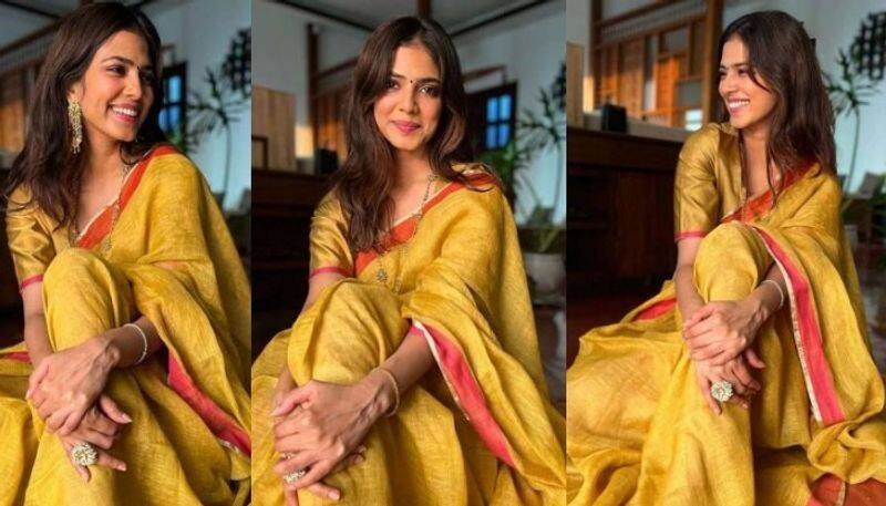 Malavika Mohanan new Photos in yellow saree