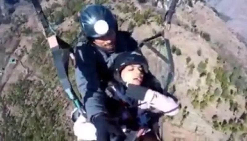 Anxious woman in viral paragliding video