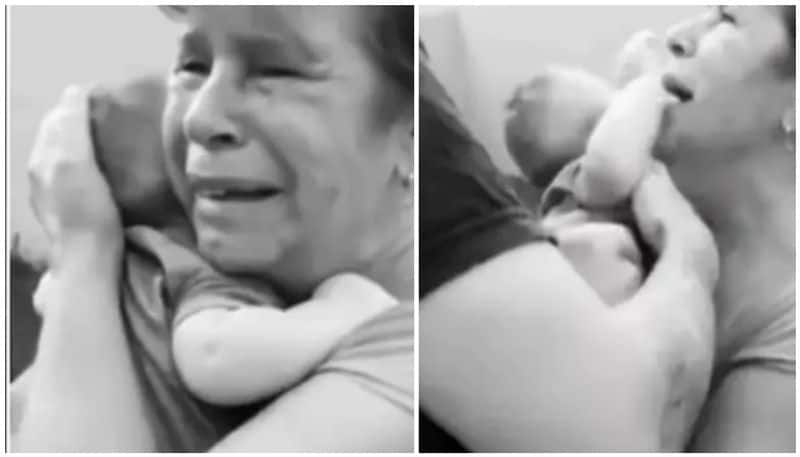 Viral Video Visually impaired woman meeting baby grandson for the first time