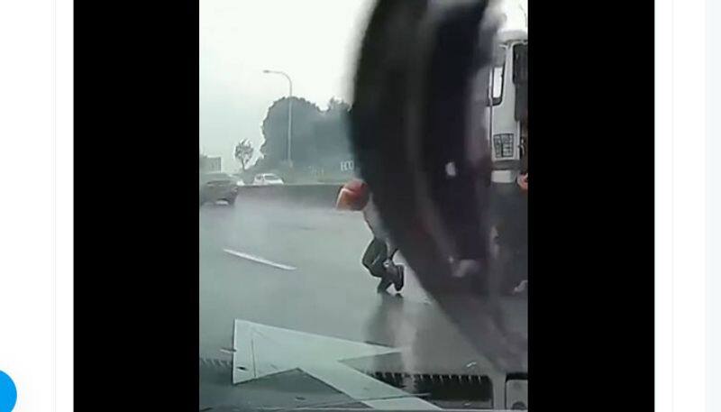 Motorcyclist Crashes In Front Of Approaching Truck. Then